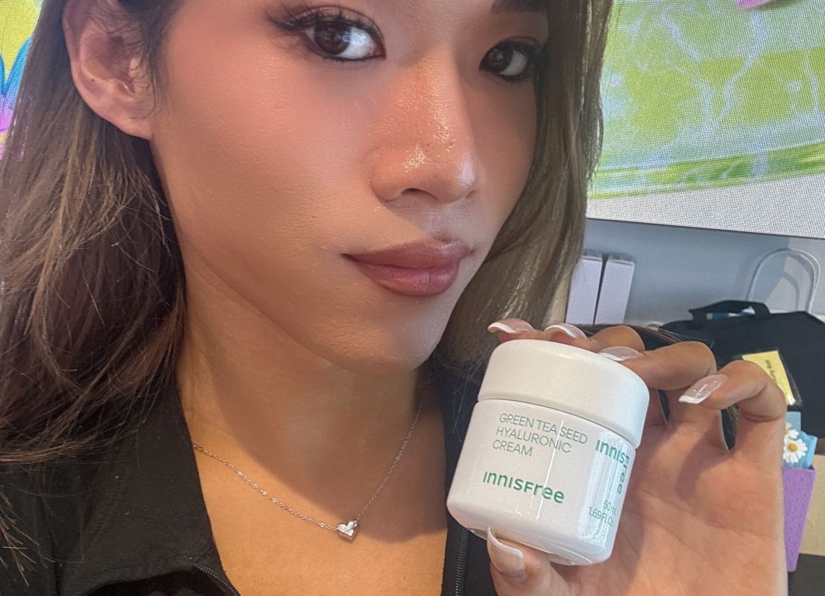Maddie holding INNISFREE Green Tea Seed Hyaluronic Cream
