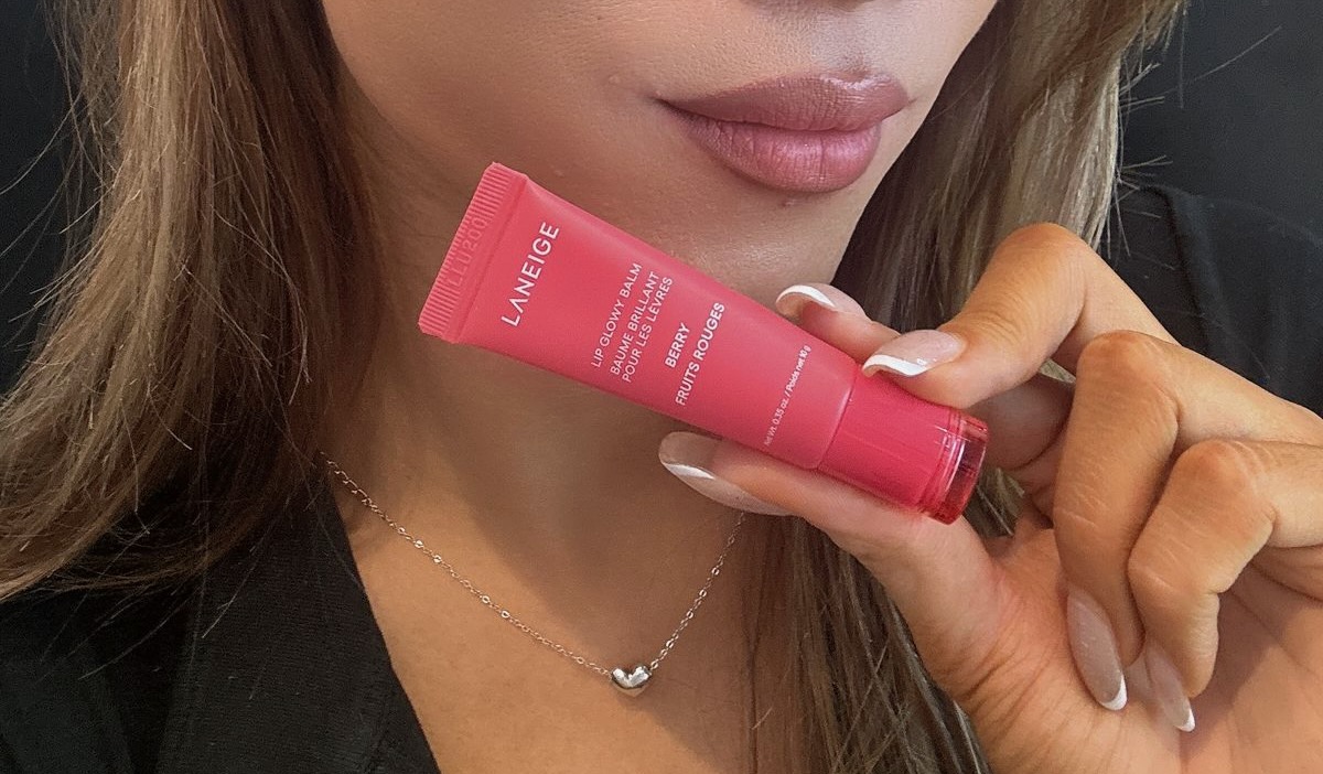 Maddie holding LANEIGE Lip Glowy Balm